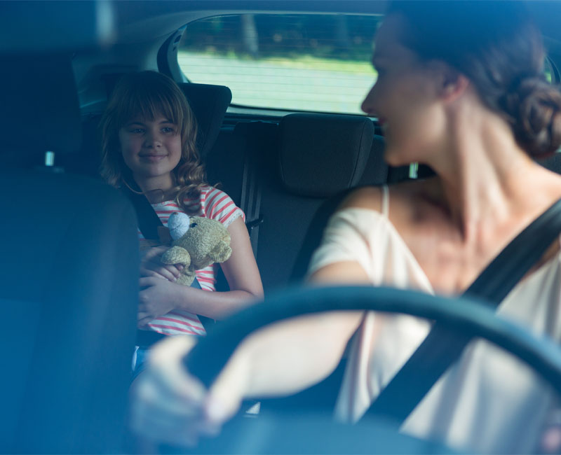 Mom and daughter in the car